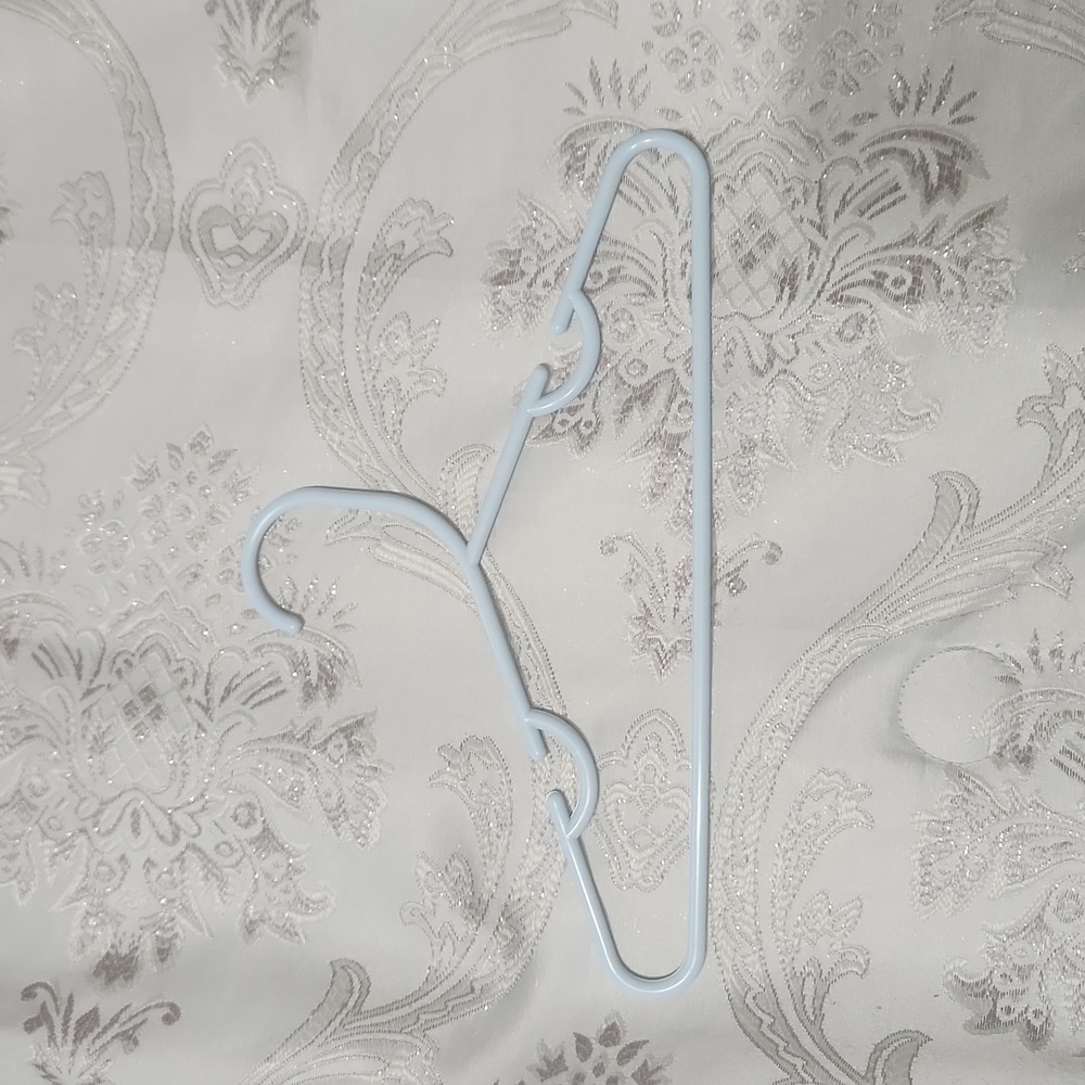 25 baby coat hangars in perfect condition